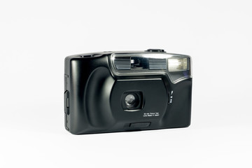 Compact 35mm film camera on white background