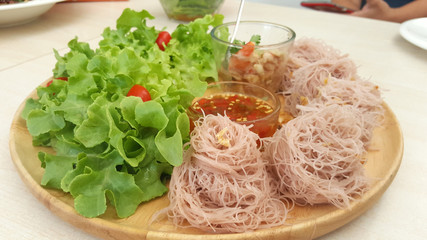 Brown Rice vermicelli with minced pork and shrimp serving with fresh salad
