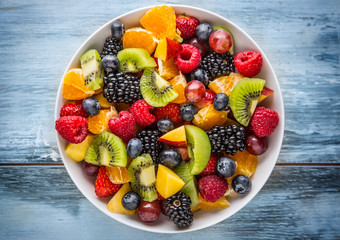 Fruit fresh mixed tropical fruit salad. Bowl of healthy fresh fruit salad - died and fitness...