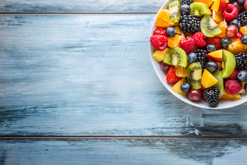 Fruit fresh mixed tropical fruit salad. Bowl of healthy fresh fruit salad - died and fitness concept.