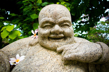 Statue Covered in Flowers