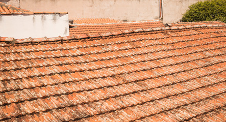 Photo of old clay roof tiles detail