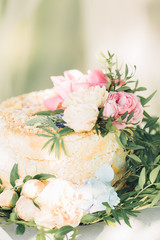 wedding cake decorated with fresh flowers