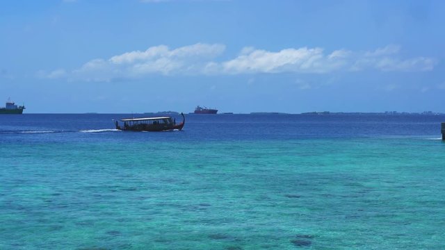 Traditional Maldives style boat sailing for tourist activities in Indian sea