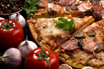 pizza with sausage and cheese and ingredients, selective focus, closeup