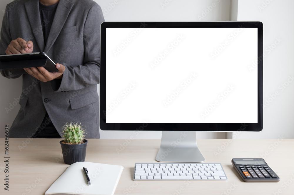 Poster young man working businessman using a desktop computer of the blank screen