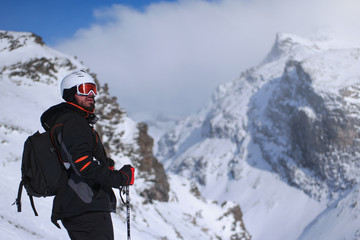 Fototapeta na wymiar Skiing: male skier in powder snow. Italian Alps, Europe.