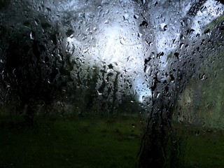Condensation of water in a car window with rain outdoor