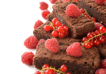 Chocolate brownies with raspberries and currants