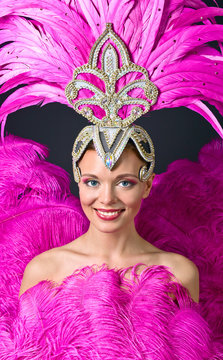  Beautiful girl in carnival costume .