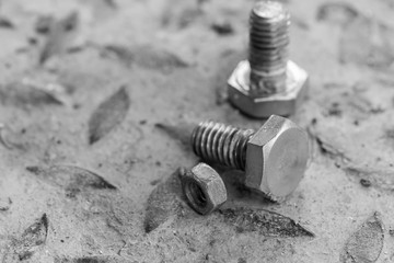 nut and bolts on checker plate