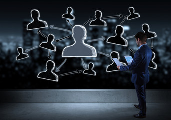 Businessman watching social network sketch on a rooftop 3D rendering