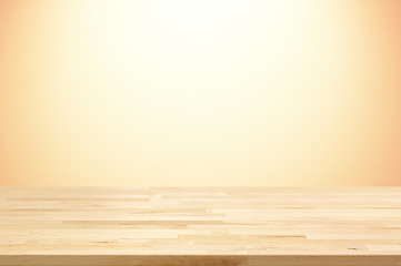 Wood table top on gradient beige background