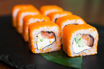 Delicious rolls with fish and cheese	