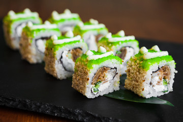 Delicious rolls with fish and cheese	