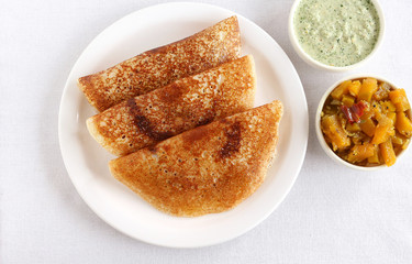 Masala dosa, a traditional and popular South Indian vegetarian food.