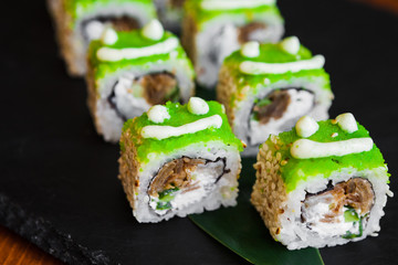 Delicious rolls with fish and cheese	