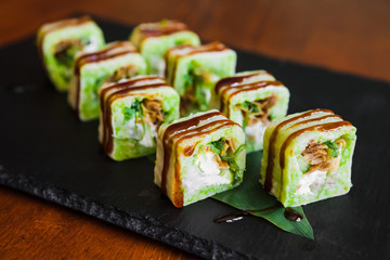 Delicious rolls with fish and cheese	