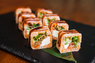 Delicious rolls with fish and cheese	