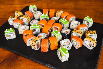 Delicious rolls with fish and cheese	