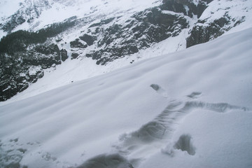 Fototapeta na wymiar human shape print in the snowfiled