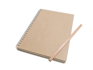 close up of notebook  with new wood pencil isolated on white background