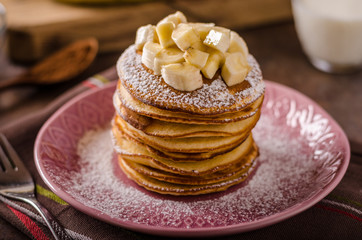 American pancakes with banana, chocolate