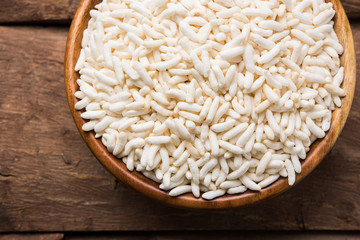 Puffed rice also known as Murmura or Murmure in hindi served in a colourful ceramic bowl or plate...