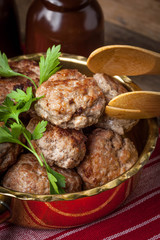 Fried pork chops in the pan.