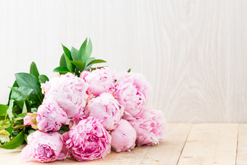 peonies flowers on table