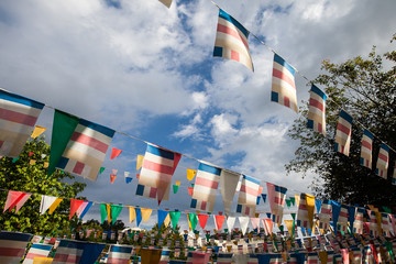 Colorful flags with blue sky