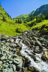 Beautiful scenery with a mountain river in the Fagarasi Mountains Romania