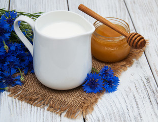 Jar of milk and cornflowers