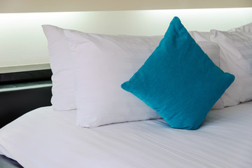 Backrest pillow and pillow on bed in modern bedroom