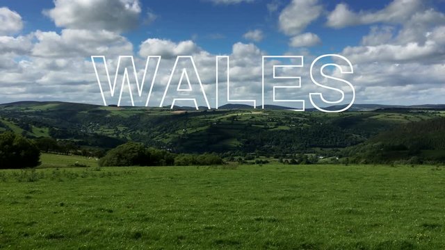 Beautiful Welsh countryside with the word 'WALES' masked into the landscape. 