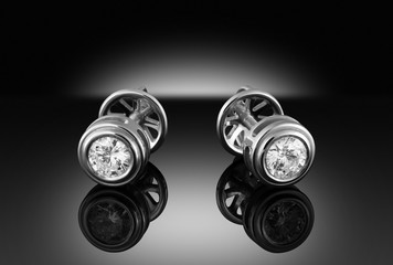 A pair of white gold earrings with diamonds la poussette