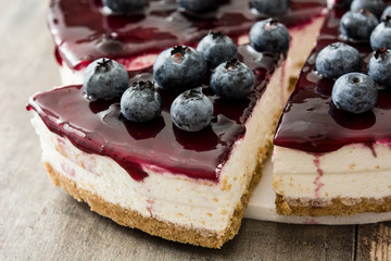 Blueberry cheesecake on wooden table
