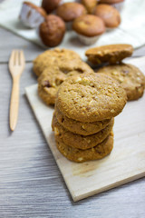 Cookies on wood cup cake blur background