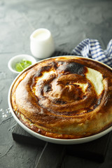Pie with potato and herbs or Burek pie