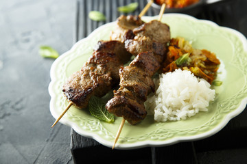 Meat skewers with hot chili sauce