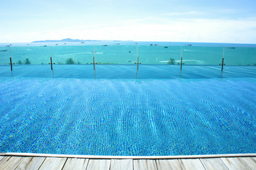 relax at swimming pool blue sky island view