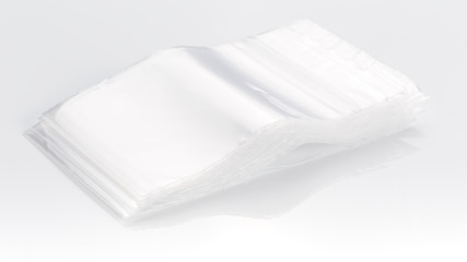 Empty transparent plastic bags on white background