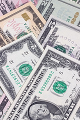 Abstract dollar bills of different denominations background.