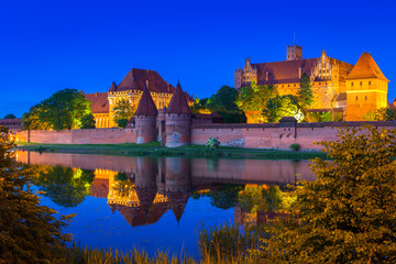 Fototapeta na wymiar The Castle of the Teutonic Order in Malbork at night, Poland