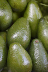 Avocados on the market, Colorful photo of avocados with defocused background, Selective focus with shallow depth of field