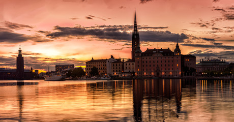 Naklejka premium Scenic Stockholm City Old Town Sunset Skyline. Panoramic montage from 31 images