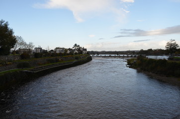 Fototapeta na wymiar River Corrib and Dam near a Cathedral in Galway, Ireland