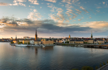 Fototapeta na wymiar Stockholm sunset with island Riddarholmen and old town Gamla Stan