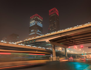 Fototapeta premium Urban dynamism in Beijing Central Business District at nighttime, China