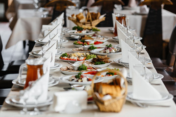 Photo of served festive table with dishes